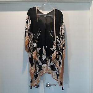 Black and gold kimono with tassels